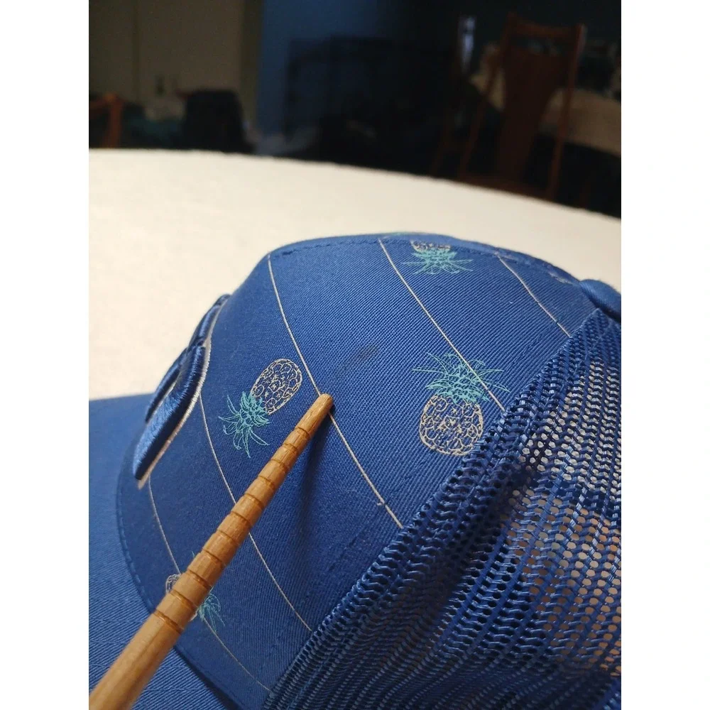 Travis Mathew Blue Pineapple Print Yupoong Adjustable Trucker Hat